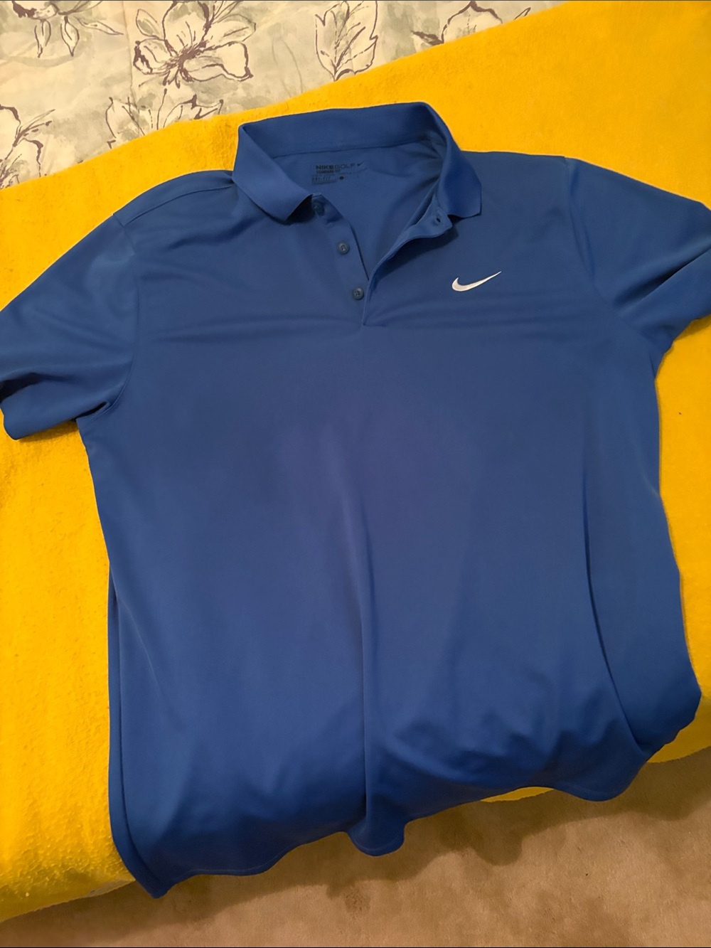 Nike Men’s Royal Blue Polo with White Swoosh